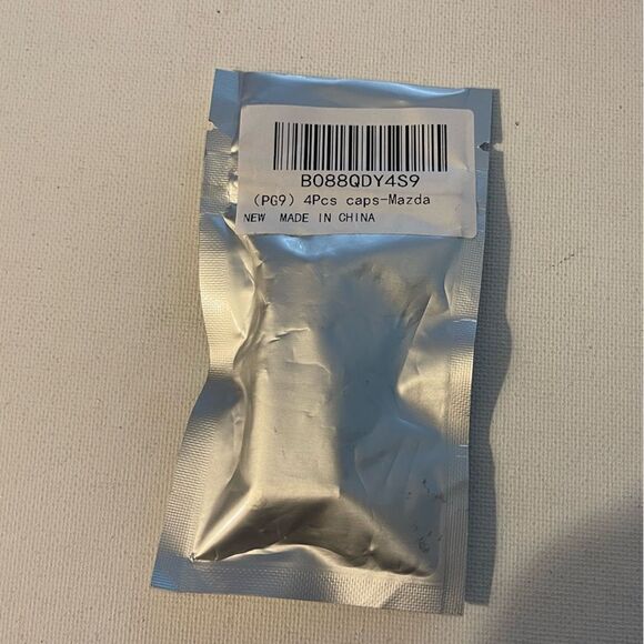 Mazda valve Stem caps in Black set of 4 NWT - Picture 4 of 4